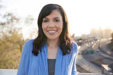 Headshot of Creative Gabriela Lopez with the 110 Freeway and Downtown Los Angeles in the background
